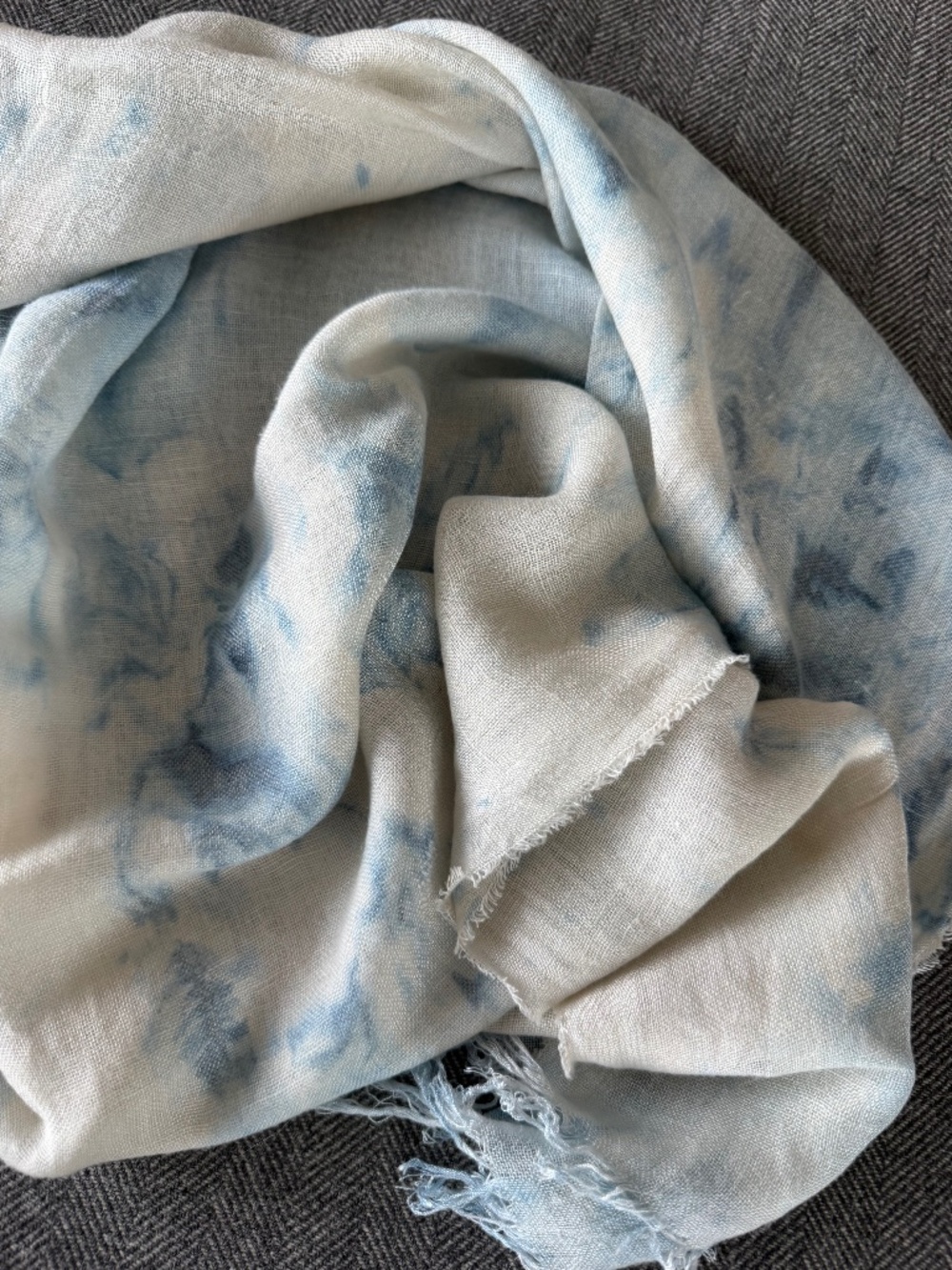 JCREW, LIGHT COLORED LINEN SCARF WITH SUBTLE AND LIGHT INDIGO PRINTED ON IT